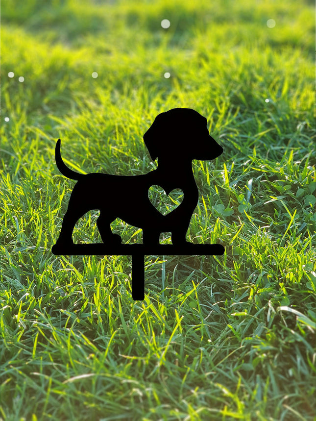Standing dog silhouette garden stake with red rose above the head