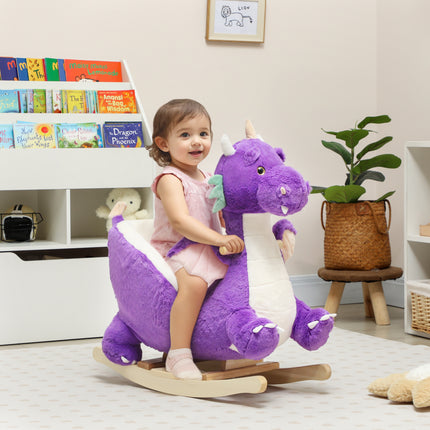 Purple plush dragon rocking horse with a wooden rocker base and rider restraint