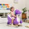 Purple plush dragon rocking horse with a wooden rocker base and rider restraint