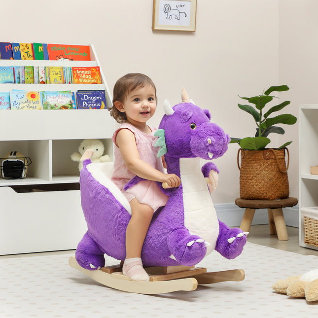 Purple plush dragon rocking horse with a wooden rocker base and rider restraint