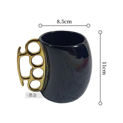 Novelty Brass Knuckle Coffee Mug – Ceramic Mug with Metallic Knuckle Handle – Unique Funny Gift for Christmas & Birthdays – 12oz Black/White Office Mug